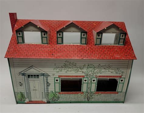 old metal doll houses 1960s|tin doll houses from 1960s.